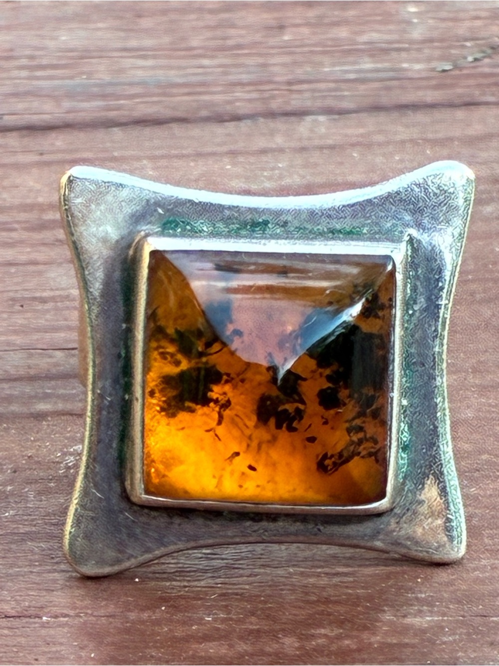 Unmarked Sterling ring with amber center